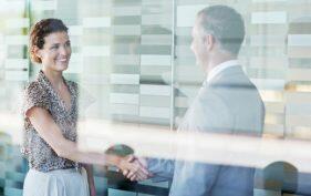 Public adjuster in Los Angeles shaking hands with a client